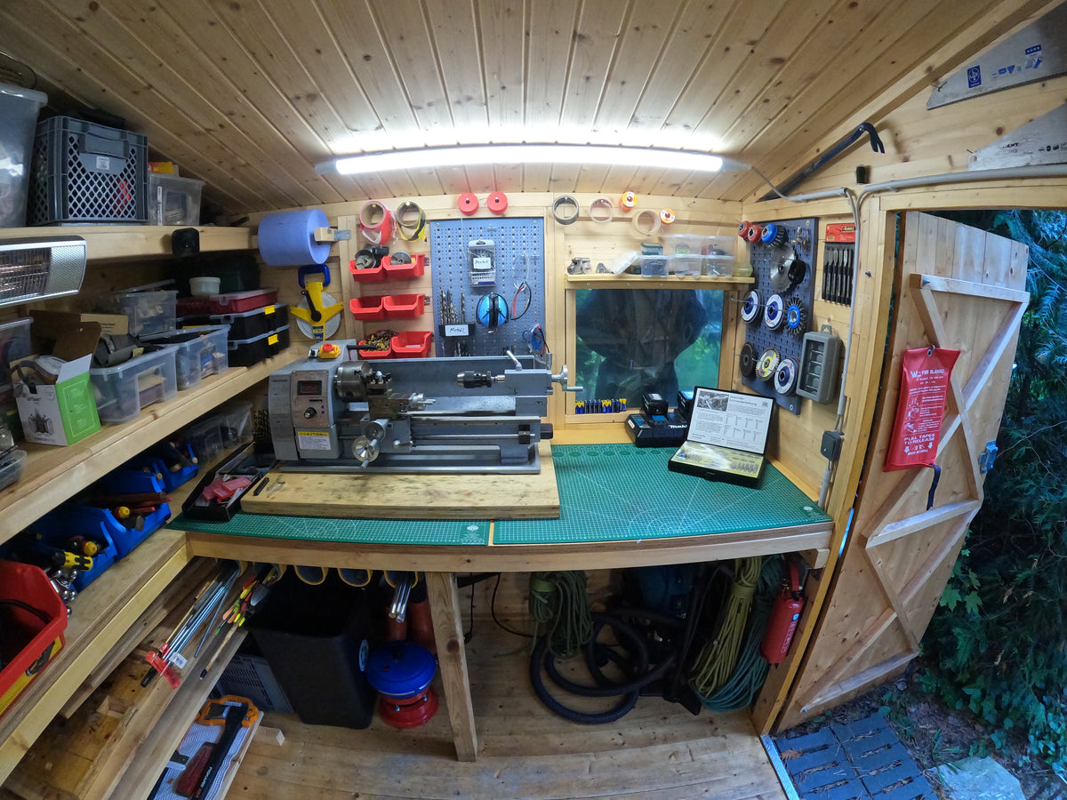Lathe and workbench inside Paul's converted shed workshop in Berlin