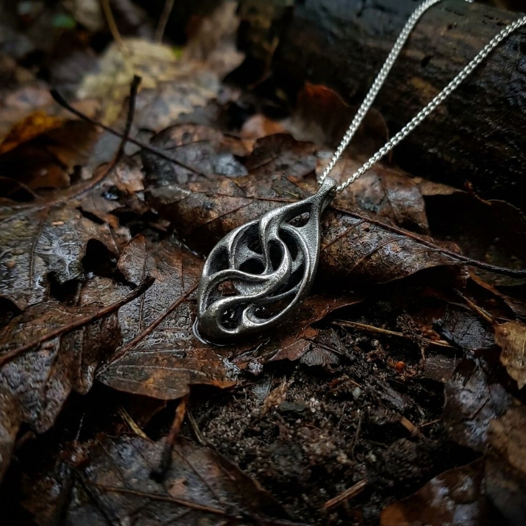 Fluxus Titanium Pendant