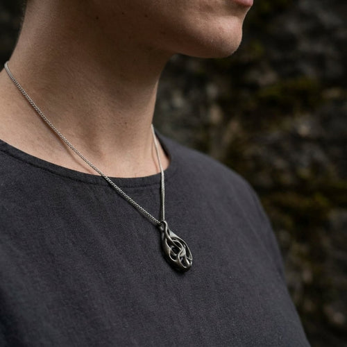 Fluxus Titanium Pendant
